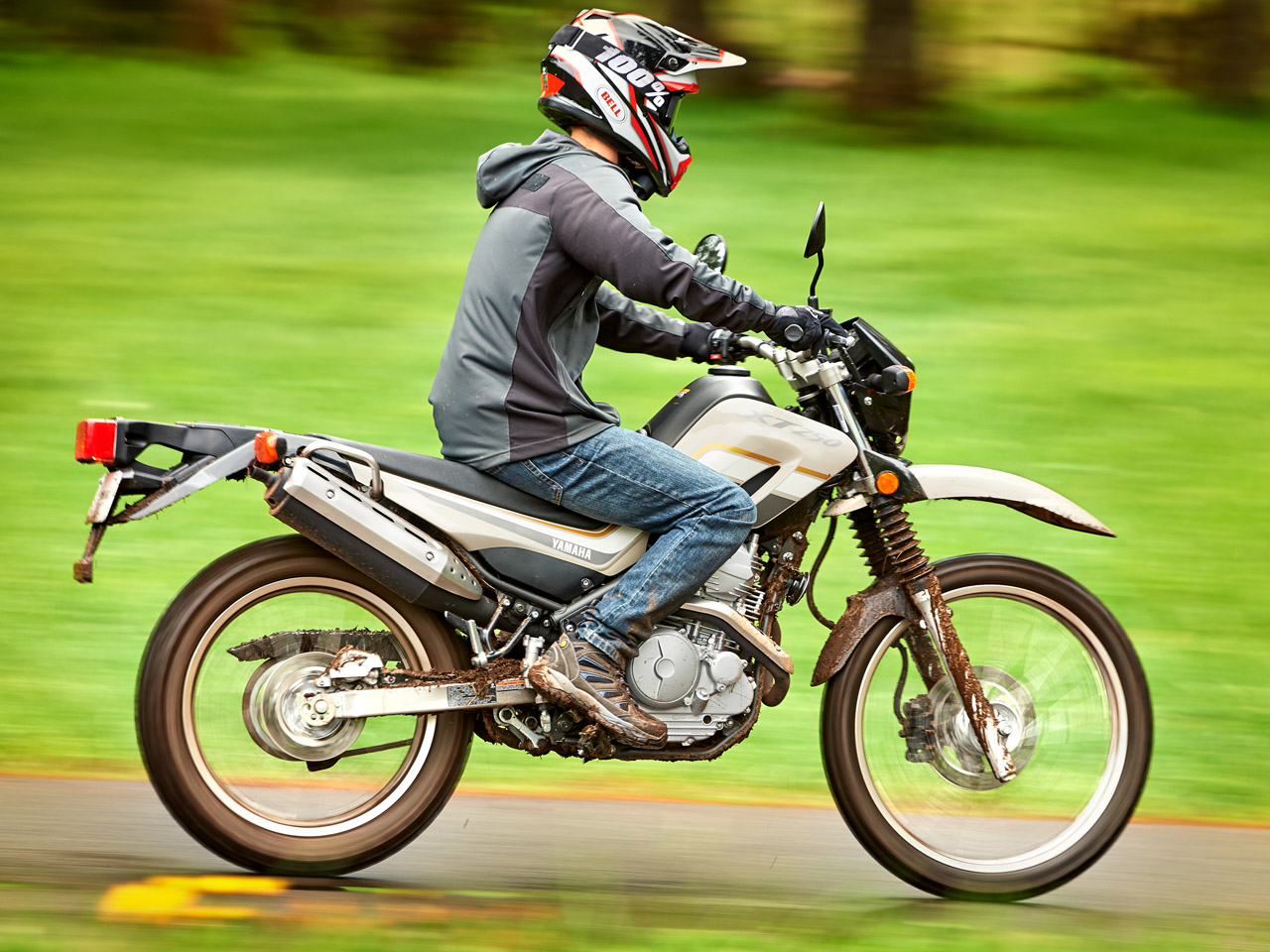 Yamaha XT250 motorcycle riding on dirt track