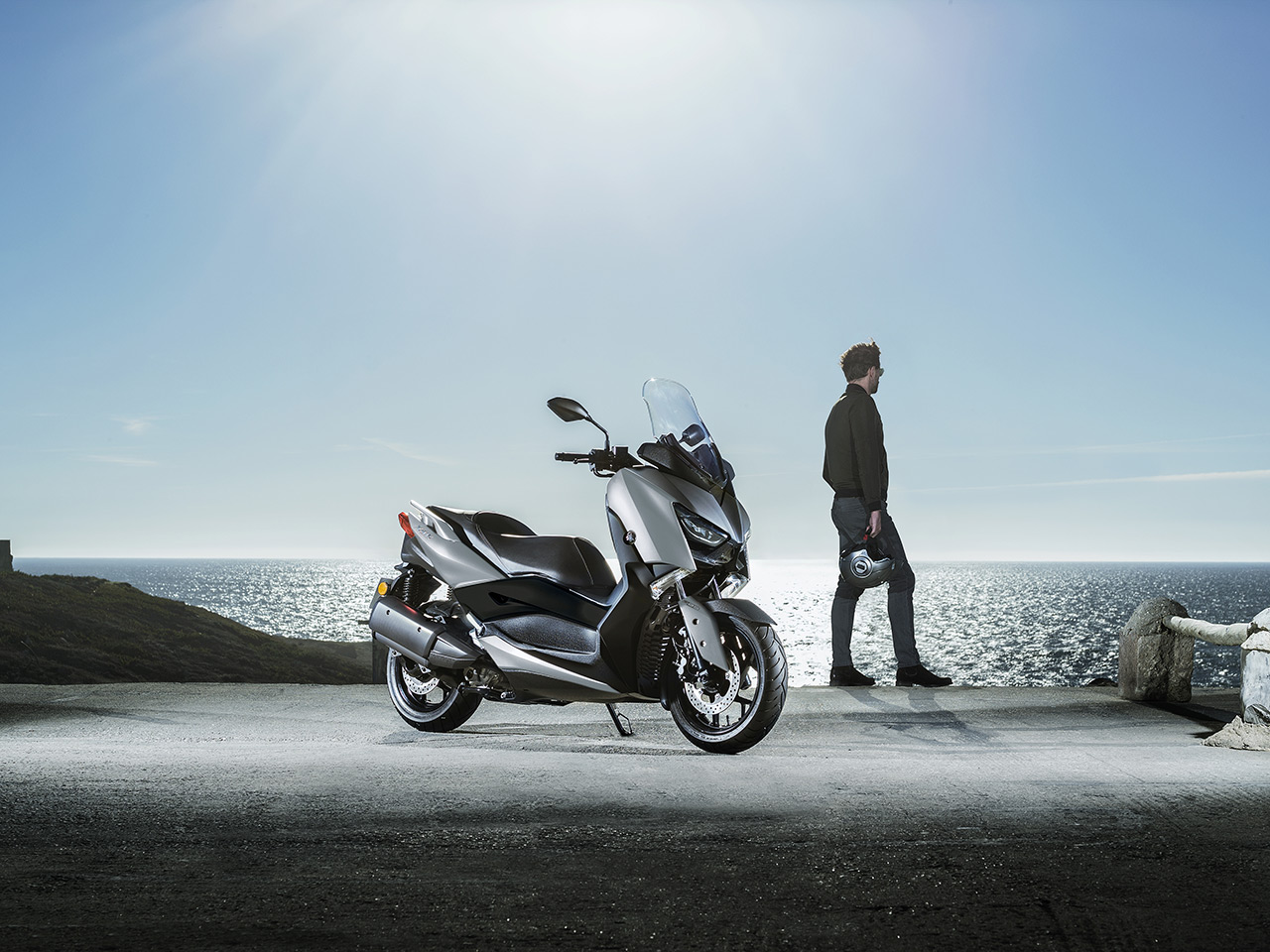Yamaha XMAX 300 scooter in Matt Silver colour parked on street